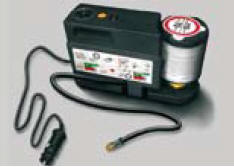The puncture repair kit is a complete system including a compressor and a setting